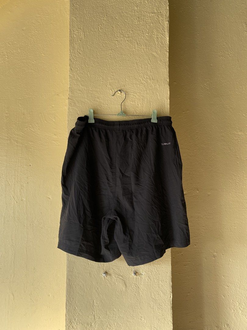 Adidas climalite shorts (Category: Shorts) located in Calapan. Submitted by mnlhabithrift23 (Listing ID 1464900397, Image 3). Description: Waist : 34 Length : 19 Leg hole : 12 Color rate : 9/10 Issue : lose gartet.