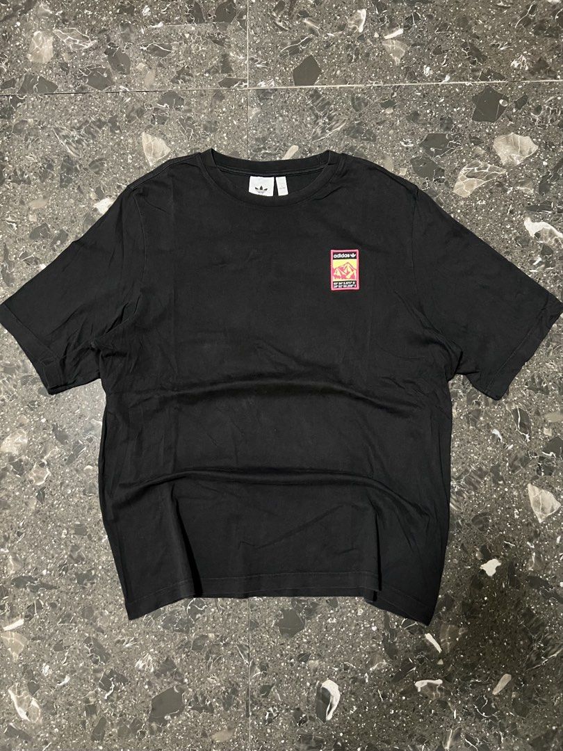 Adidas Graphic Tee Black Mountain Logo Size L (Category: Tshirts & Polo Shirts ) located in San Fernando. Submitted by justin_sy (Listing ID 1464887560, Image 1). Description: - Brand: Adidas - Color: Black - Size: L (Standard fit) - Material: 100% Cotton (Machine washable) - Design: Colorful mountain landscape patch on chest & large matching coordinate graphic print on back (49° 34' 5.875" N, 10° 52' 58.288" E) - Style: Classic crew neck, short 
