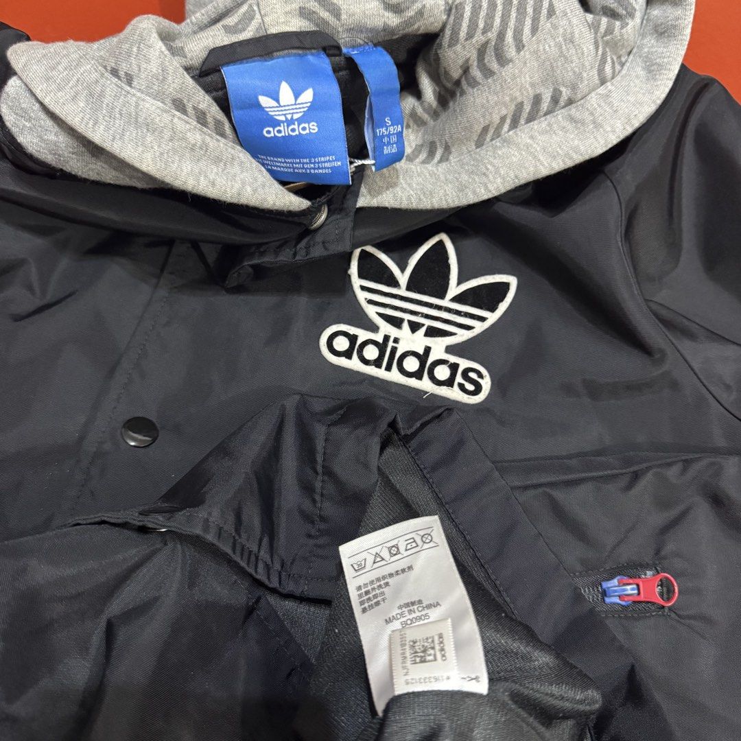 ADIDAS HOODED VARSITY JACKET (Category: Coats, Jackets and Outerwear) located in Pasig City. Submitted by buzzthrifty (Listing ID 1464892155, Image 3). Description: SIZE M-L 21x27 EXCELLENT CONDITION .