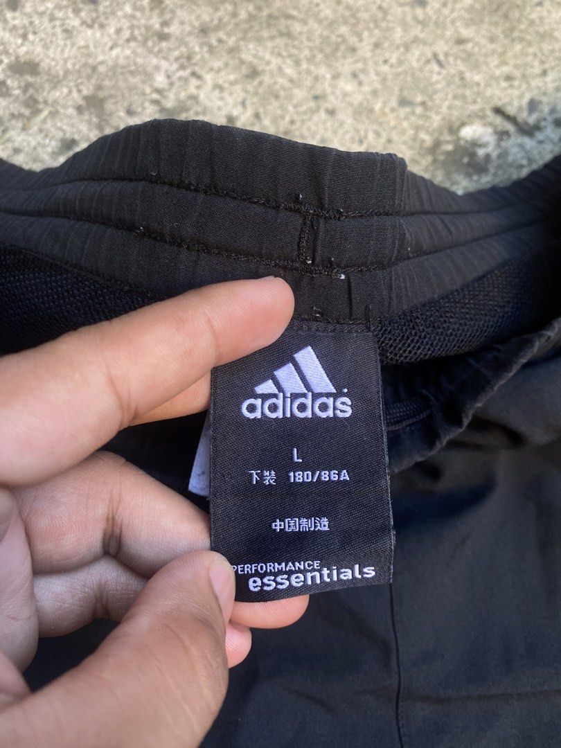 Adidas Performance Essentials Black short (Category: Shorts) located in Binan City. Submitted by johndeluna03242 (Listing ID 1464801562, Image 2). Description: 36 waist asjustable Length 16inch above the knee Hem-14 inch Complete tags No issue Excellent condition 9.5/10 cr Can pass as new 350💵.