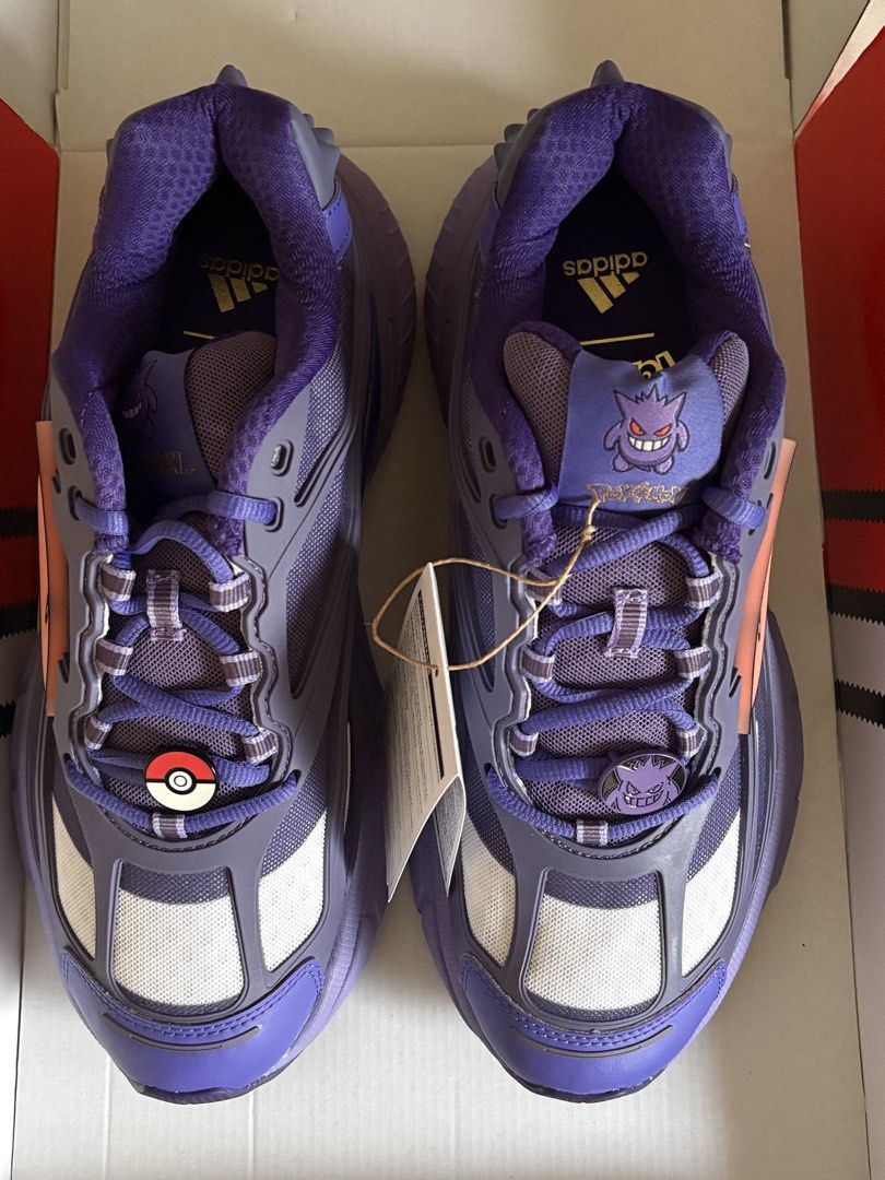 Adidas Pokemon Gengar Sneakers (Category: Sneakers) located in Cebu City. Submitted by romeogolfing (Listing ID 1464799060, Image 2). Description: - Brand: Adidas x Pokémon (Gengar Edition) - Condition: Brand new, unworn with store tags attached - Colorway: Purple with white mesh panels - Size: 27cm Mens - Special Features: Gengar and Pokémon graphic tags on laces and tongue - Packaging: Includes original Pokéball-themed box.