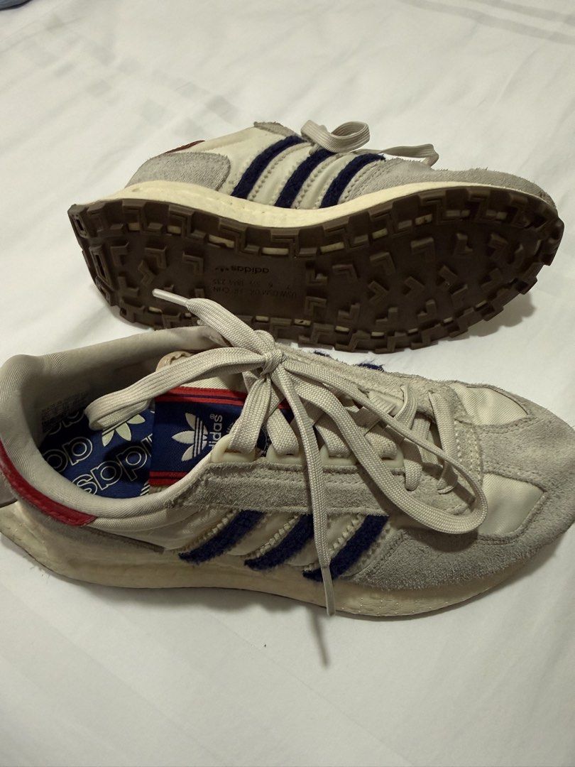 Adidas Retropy E5 Sneakers (Category: Sneakers) located in Quezon City. Submitted by jessyda (Listing ID 1464826643, Image 2). Description: - Model: Retro runner style in off-white suede and mesh with iconic dark blue three stripes - Sole: Classic brown gum rubber outsole with a cushioned midsole for all-day comfort - Size: US 7 / UK 5.5 / EUR 38 2/3 - Condition: Shows normal signs of wear on soles and uppers, giving it an awesome vintage look - 