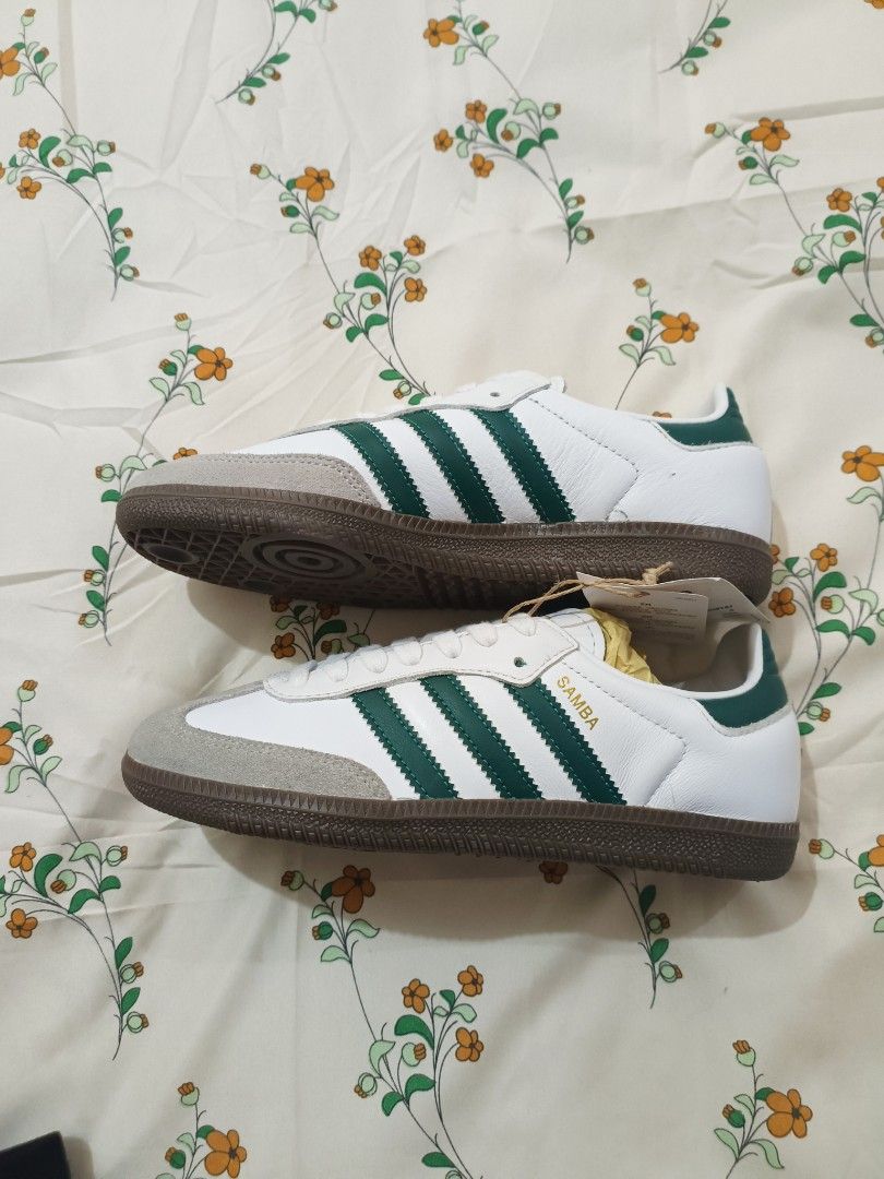 Adidas Samba White Green Sneakers (Category: Sneakers) located in Baguio. Submitted by maria.s0329822318 (Listing ID 1464785433, Image 1). Description: - Brand: Adidas Samba - Colorway: White and green with classic gum sole and suede toe overlay - Condition: Brand new, fresh out of the box with original tags and stuffing - Details: Iconic gold foil Samba lettering on the side, standard lace-up design - Style: Clean, versatile look that easily mat