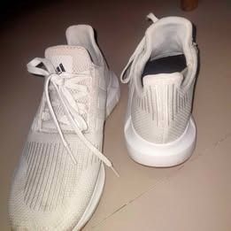 Adidas Swift Run White Sneakers (Category: Sneakers) located in Angeles City. Submitted by wildmountain_8fada7 (Listing ID 1464834844, Image 2). Description: - Brand: Adidas Swift Run (Men's Swift Run 1.0 Shoes) - Color: Classic White - Size: [6.5 US] - Condition: Good as new - Features: Breathable mesh upper, comfortable cushioning, iconic three stripes. Daily sneakers with the comfort and style to push through any grind. Comfort and fashion com