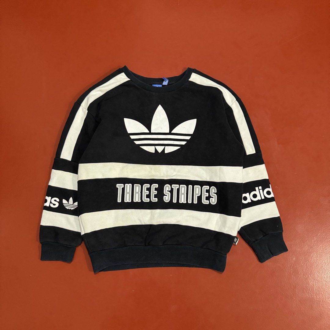 ADIDAS THREE STRIPES SWEATER (Category: Coats, Jackets and Outerwear) located in Pasig City. Submitted by buzzthrifty (Listing ID 1464887745, Image 1). Description: SIZE M-L 21x25 EXCELLENT CONDITION WASH ONLY .