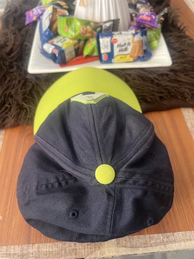 Aeropostale Flexfit Letter A Hat (Category: Caps & Hats) located in Manila. Submitted by declutteringlangpo (Listing ID 1464780500, Image 2). Description: - Brand: Aeropostale - Color: Navy blue with neon green brim and top button - Design: Large embroidered white and green 'A' logo on the front - Size: L/XL with Flexfit stretch band for a snug, comfortable fit - Material: Cotton and polyester blend - Condition: Brand new with tags inside.