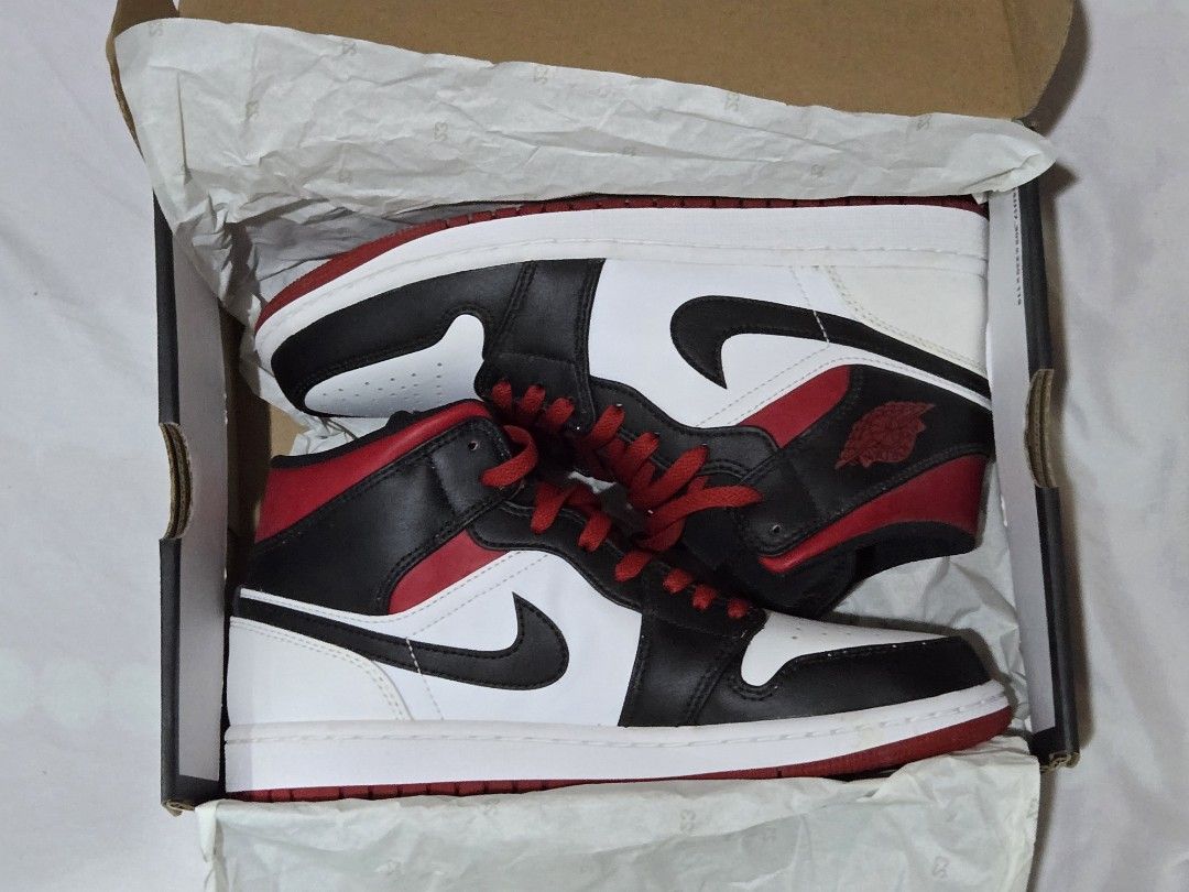 Air Jordan 1 Mid Red Black White (Category: Sneakers) located in Naic. Submitted by ad_hi_def (Listing ID 1464896569, Image 1). Description: RFS: not my exact size No reservations, first to pay basis Strictly no meetups Authentic, bought in Dubai (no receipt but will try to find).
