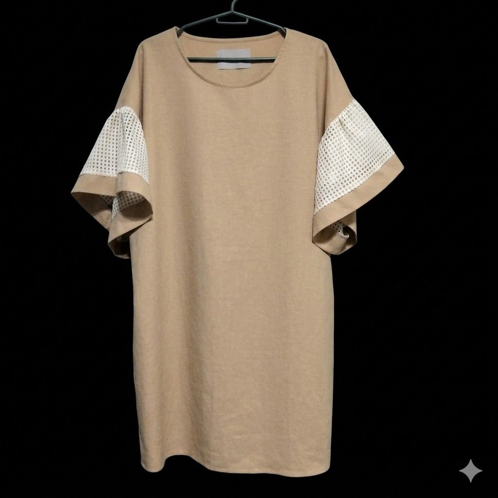 Alamode Studio Beige Dress Size 77 (Large) (Category: Dresses) located in Pasig City. Submitted by kat_grande (Listing ID 1464921686, Image 2). Description: - Brand: Alamode Studio - Size: 77 - Large to Extra Large Bust 47 inches Length 34 inches - Color: Beige - Fit: Loose, boxy slip-on style - Neckline: Round neckline - Details: Short sleeves with unique white grid mesh panels on both sides - Condition: Excellent.