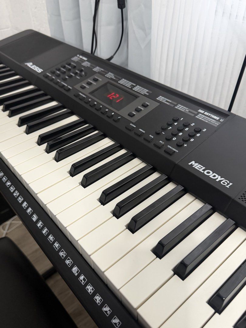 Alesis Melody 61 Keyboard with Stand and Bench (Category: Musical Instruments) located in Manila. Submitted by bertomax (Listing ID 1464857409, Image 1). Description: - Alesis Melody 61 keyboard with built-in speakers and digital display - Features multiple built-in tones and rhythms - Includes sturdy X-frame stand - Includes sheet music rest - Includes comfortable padded black bench - Everything pictured is included as a complete set - Ready for