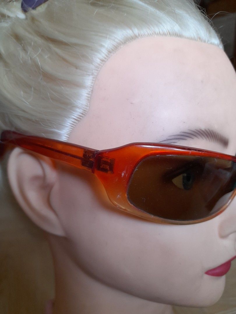 Amber Brown Gradient Sunglasses Orange Tortoise Frames (Category: Sunglasses & Eyewear) located in Bocaue. Submitted by marajapansurplus (Listing ID 1464809342, Image 2). Description: - Style: Bold rectangular everyday frames - Color/Pattern: Orange tortoise shell with warm brown gradient lenses - Details: Sturdy plastic temples with stylish metal emblem near the hinge - Condition: Clean lenses, well-kept, and gently used.