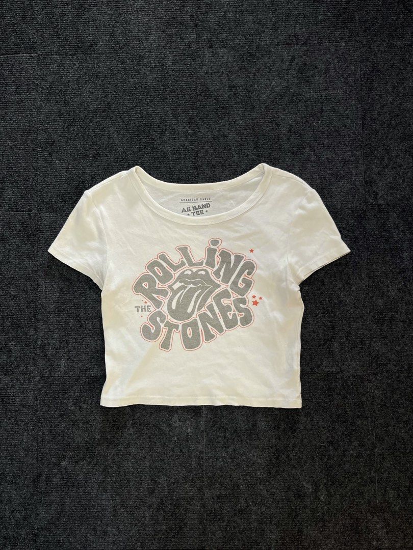 American Eagle Rolling Stones Band Tee Crop Top (Category: Shirts) located in Los Banos. Submitted by reworn.clo2026 (Listing ID 1464904039, Image 1). Description: Best fit: Small * Width: 16 * Length: 16.5 * Good condition * Color rate: 9/10 * See last pic for reference .