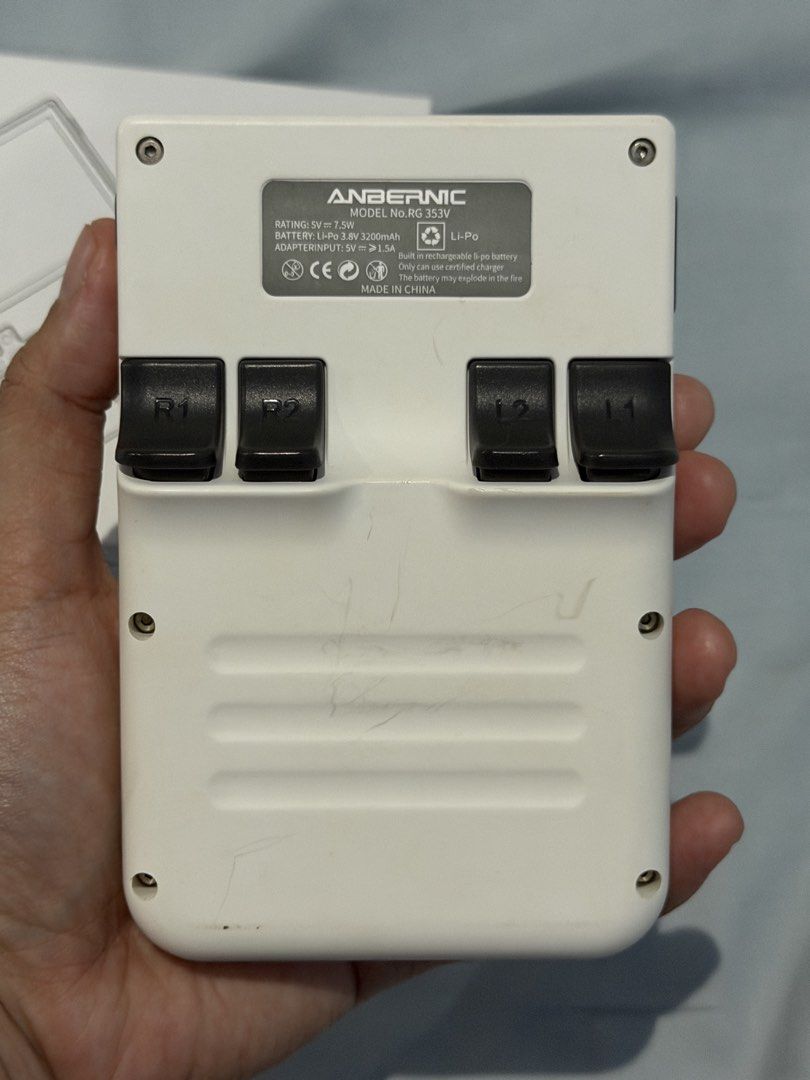Anbernic RG353V (Category: Nintendo) located in Taytay. Submitted by bonaventejill (Listing ID 1464923341, Image 2). Description: - White - Comes with the original retail box - No charging cable - Great for retro gaming enthusiasts looking for a reliable pocket emulator.