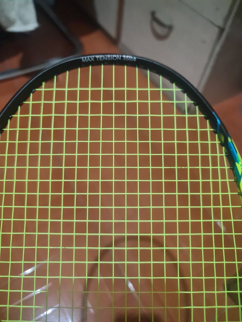 Apacs Lethal 28 Badminton Racket (Category: Racket and Ball Sports) located in Manila. Submitted by josejhayco69373 (Listing ID 1464868905, Image 3). Description: - Model: Apacs Lethal 28 Badminton Racket - Performance: Excellent power and durability, perfect for intermediate to advanced players - Strings: Neon yellow string with a maximum tension of 35lbs - Grip: Black grip tape newly wrapped on the handle - Inclusion: Matching black Apacs zip c