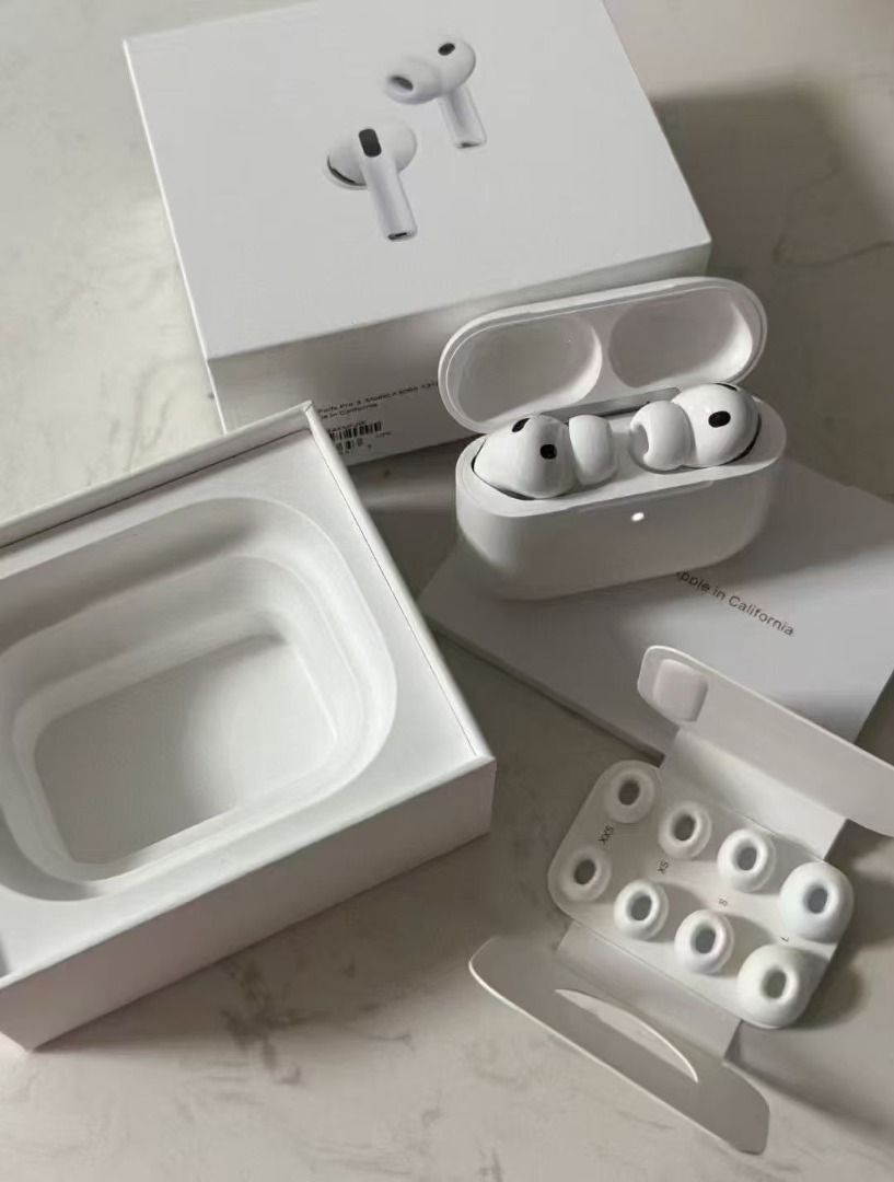 Apple AirPods Pro 3 Wireless Headphones (Category: Headphones & Headsets) located in Las Pinas. Submitted by gentletree_31ead6 (Listing ID 1464772356, Image 3). Description: - Clean white wireless headphones and charging case - Includes original retail box and paperwork sleeve - Comes with extra silicone ear tips in various sizes - Features built-in charging dock compartment inside the box - Excellent condition, well-maintained.
