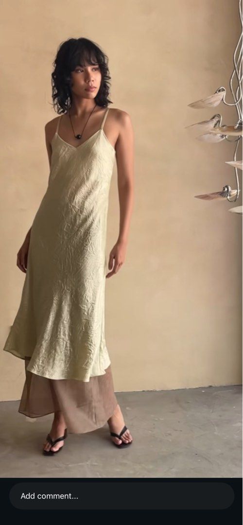Araw Crinkle Satin Midi Dress (Category: Dresses) located in Muntinlupa City. Submitted by patchessss (Listing ID 1464923048, Image 2). Description: - Color: super light greenish yellow - Design: adjustable straps, midi dress - Maxi skirt for layering also available .