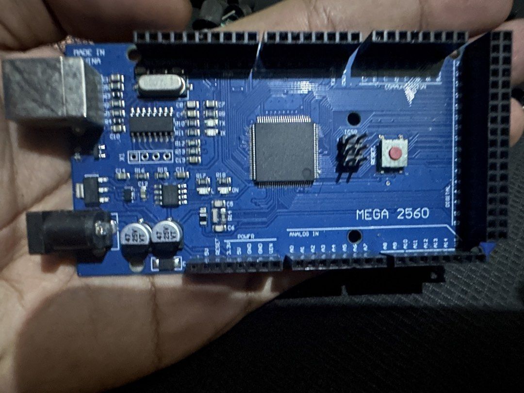 Arduino Mega 2560 Microcontroller Board (Category: Computer Parts) located in Pasay City. Submitted by axccyyy (Listing ID 1464843491, Image 1). Description: - Model: Arduino Mega 2560 (Blue PCB, ATmega2560 chip) - Condition: Pulled from a working project, clean pins and solder joints - Features: Standard layout, USB port, power jack, and standard pin headers - Compatibility: Fully compatible with the Arduino IDE - Ideal For: Robotics, 3D printer