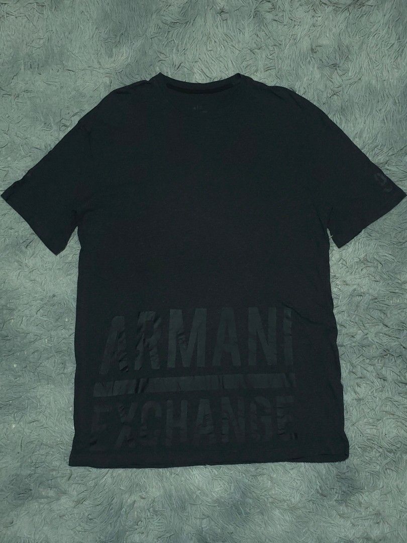 Armani Exchange (Category: Tshirts & Polo Shirts ) located in Abulug. Submitted by humanwhosellthings (Listing ID 1464900384, Image 1). Description: ARMANI EXCHANGÈ Dark Gray Tee ✅️Size: Small on tag fit to Large ✅️Dimes: 20W x 29.5L ✅Condition: Excellent- New ✅Issue: None ✅Color Rate: 9.8/10.