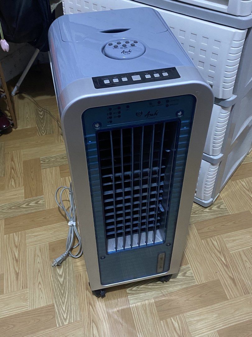 Asahi IC-009 Air Cooler (Category: Air Conditioning and Heating) located in Quezon City. Submitted by 4riazuki (Listing ID 1464864373, Image 2). Description: - Brand/Model: Asahi Air Cooler IC-009 - Color: Stylish grey and blue - Features: Top and front control panels, oscillation, multiple modes, timer, ionizer, and cooling function - Convenience: Equipped with bottom wheels for easy mobility, a top-opening water compartment, and a fully opening