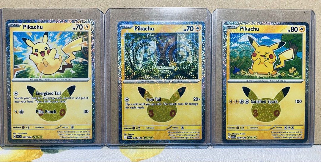 Assorted characters (Category: Raw Singles) located in Angeles City. Submitted by lensongsong (Listing ID 1464799718, Image 1). Description: Cards never played NM Php 400.00 each 1.Pikachu 037/128 Pokemon 30th Anniversary Holo - TCG 2.Pikachu 039/128 Pokemon 30th Anniversary Holo - TCG 3.Pikachu 050/128 Pokemon 30th Anniversary Holo - TCG Php400.00 4.Scraggy 140/128 30th Celebrations Illustration Rare - TCG Php630.00 5.Mew ex 066/128 30th Celebra