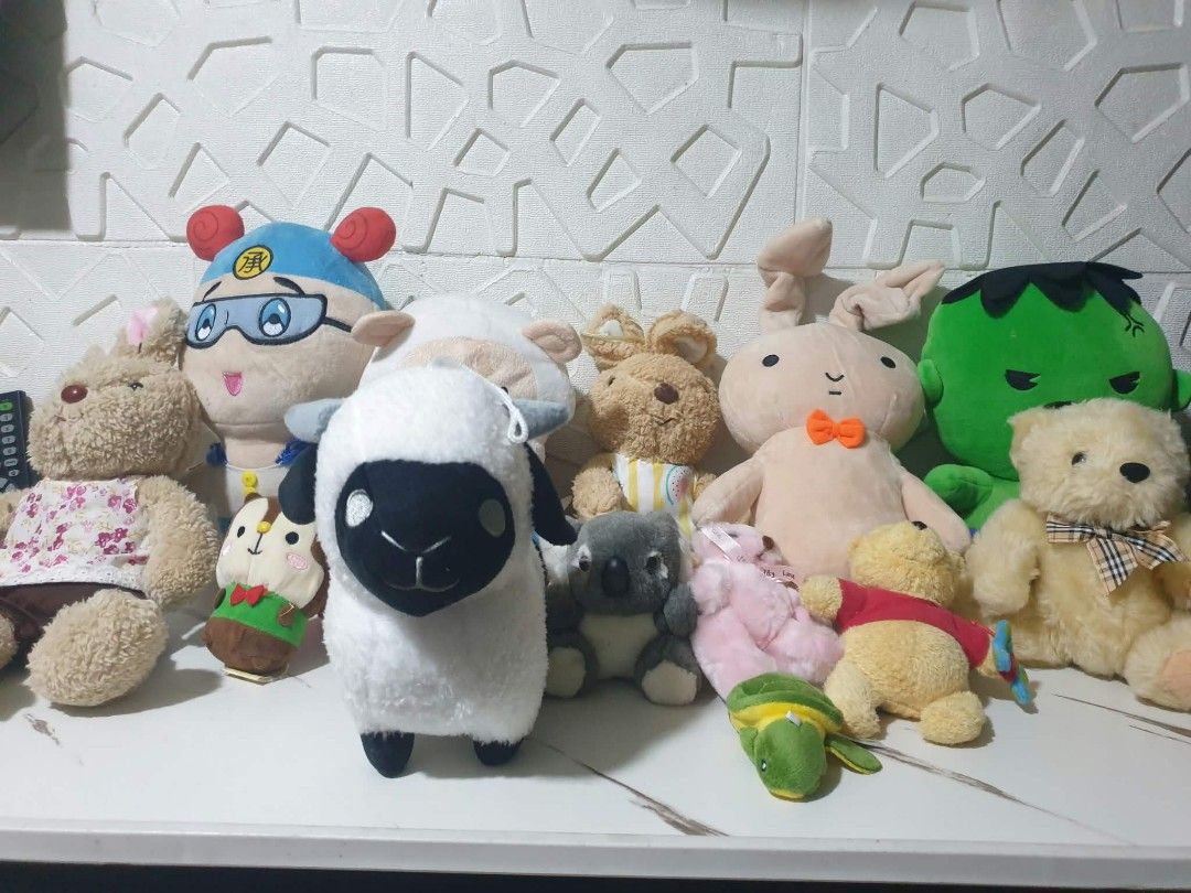 Assorted Cute Stuffed Toys Plushies Lot (Category: Plushies & Soft Toys) located in Manila. Submitted by miguellags_ (Listing ID 1464880031, Image 1). Description: Collection of various plush toys including a fluffy white sheep, teddy bears, a cartoon character with blue hair, a green Hulk figure, and multiple stuffed animals. Different sizes and styles mixed together. Clean fabrics, soft filling. Great bundle for kids or collectors wanting multi