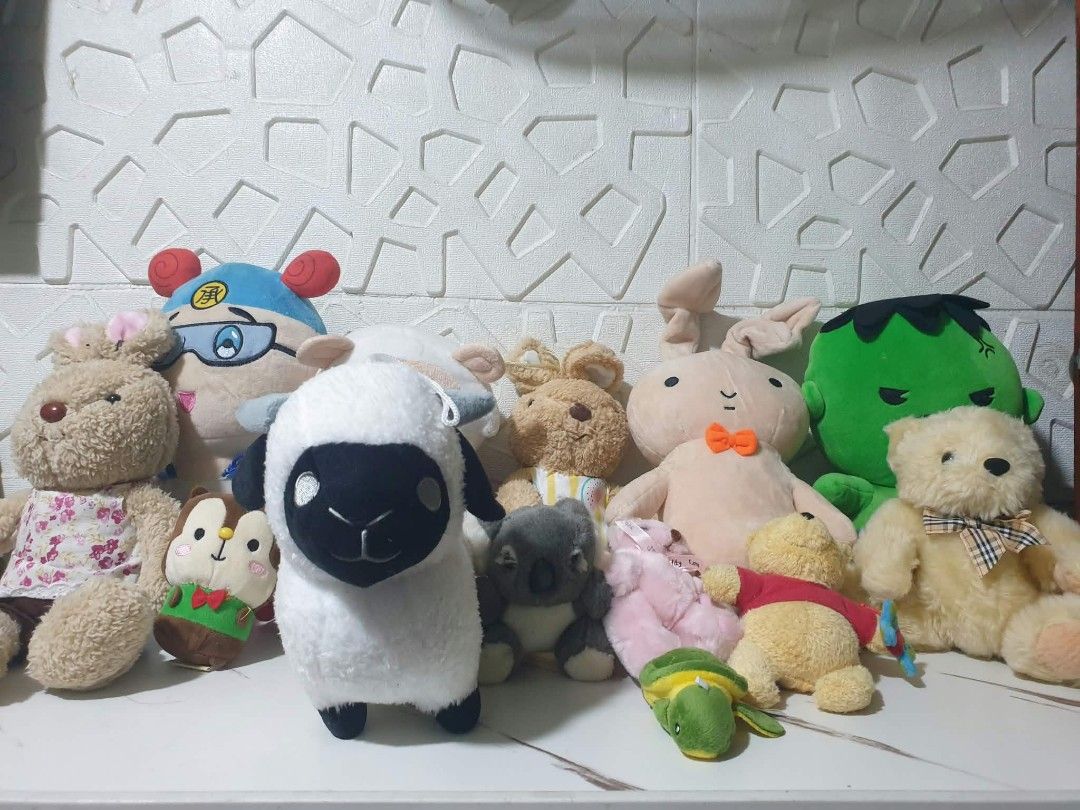 Assorted Cute Stuffed Toys Plushies Lot (Category: Plushies & Soft Toys) located in Manila. Submitted by miguellags_ (Listing ID 1464880031, Image 2). Description: Collection of various plush toys including a fluffy white sheep, teddy bears, a cartoon character with blue hair, a green Hulk figure, and multiple stuffed animals. Different sizes and styles mixed together. Clean fabrics, soft filling. Great bundle for kids or collectors wanting multi