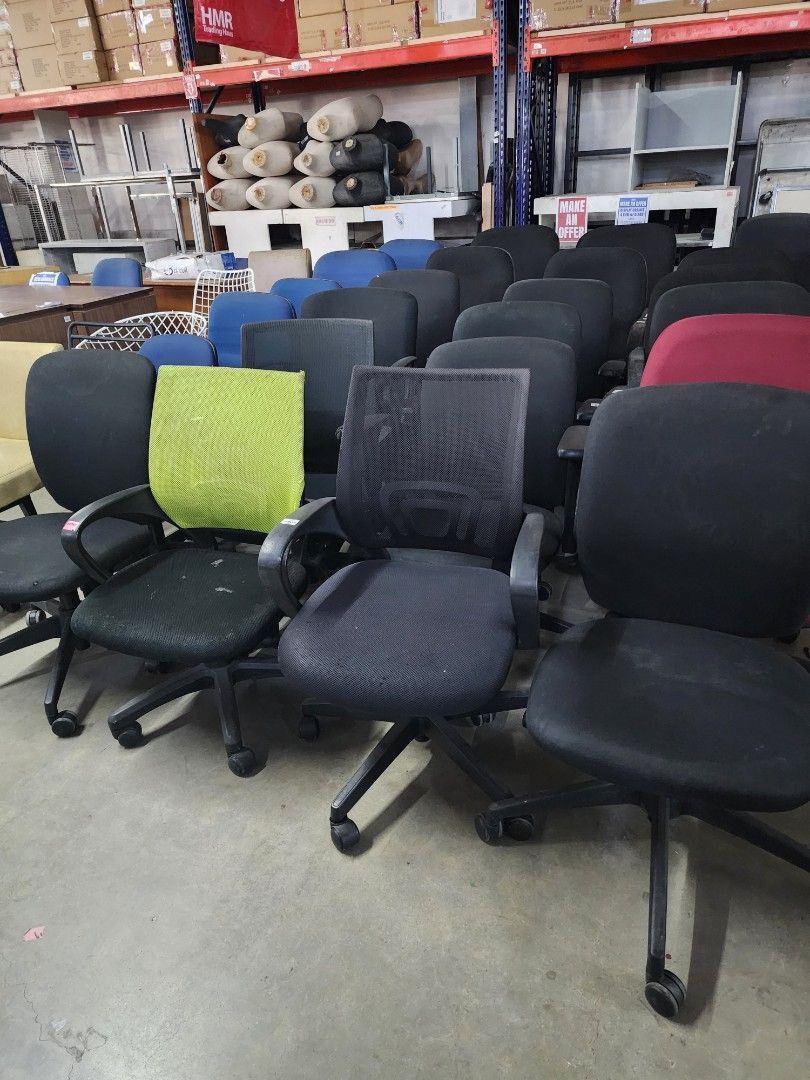 Assorted Office Chairs Mesh and Fabric Various Colors Available (Category: Office Furniture & Fixtures) located in Cainta. Submitted by christine07. (Listing ID 1464770106, Image 2). Description: - Variety of colors: Black mesh, bright green, blue, and red - Features: Rolling caster base and adjustable height mechanism - Condition: Minor dust and scuffs from warehouse storage - Ideal for: Home offices, workspaces, or study rooms - Available for i