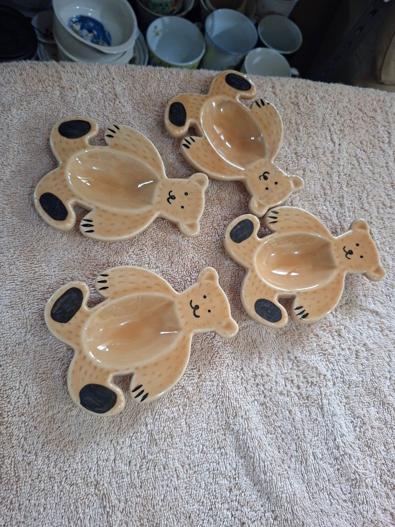 August Ceramics Teabag Holder / Small Trinket Tray (Category: Other Kitchenware & Tableware) located in Consolacion. Submitted by luxekerei (Listing ID 1464924732, Image 1). Description: - are August Ceramics brown ceramic teddy bear dishes that can be used as teabag holders, spoon rests, or small trinket trays..