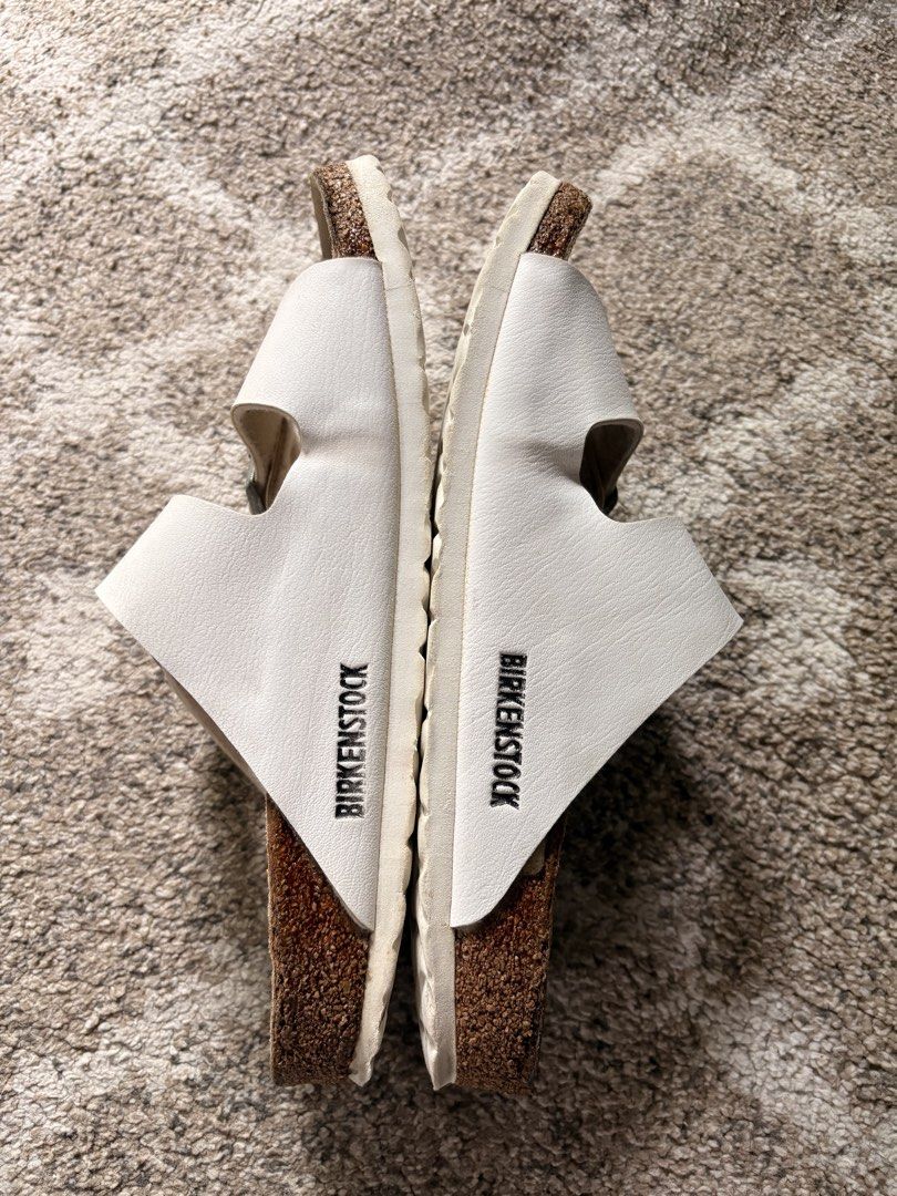 Auth Preloved Birkenstock Arizona (Category: Slippers and slides) located in Paranaque City. Submitted by silentstone.dolphin (Listing ID 1464773857, Image 3). Description: White Color.. Brass Buckle.. Visible Print.. Size 40N-39R.. Clean&Ready to Wear✅ Super Nice in Actual😍.