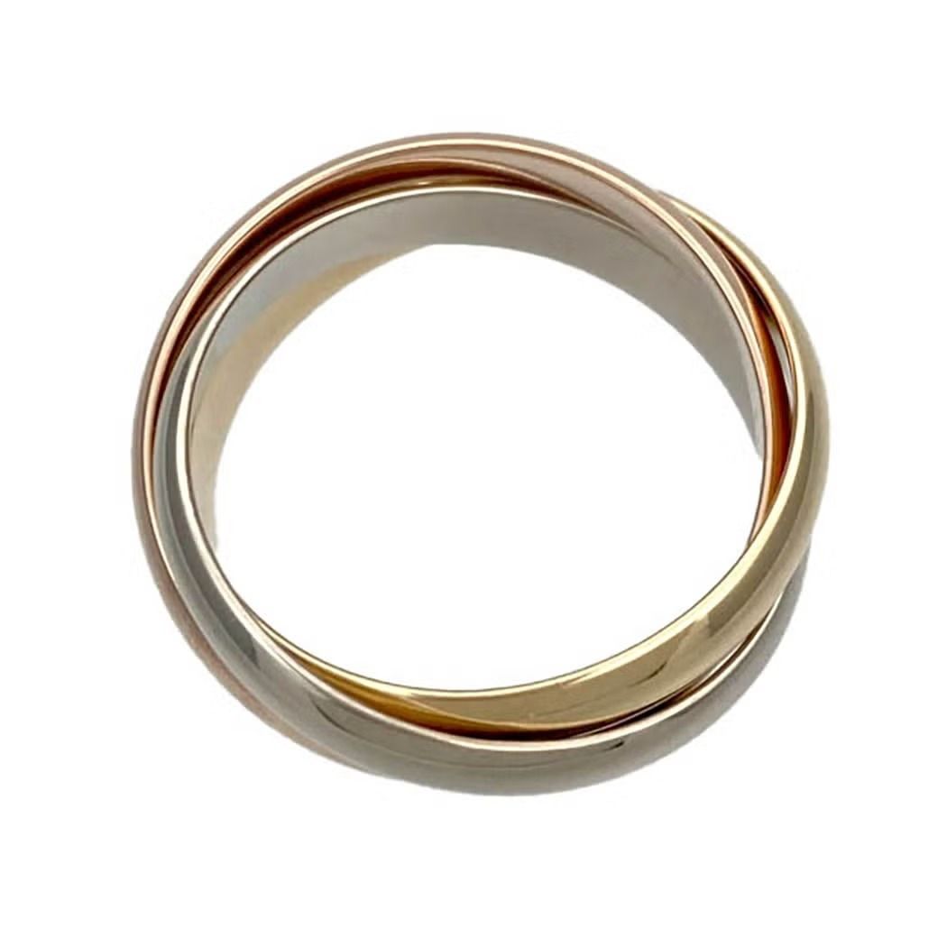 Authentic Cartier Trinity Ring #54 (Size 14) 750 WG YG PG (Category: Rings) located in General Trias. Submitted by japan_secondhand_products (Listing ID 1464878754, Image 2). Description: Product Rank A color 3 gold material 750 WG×YG×PG size Weight: 7.8g specification Size: #54 gauge Actual size: Size 14 Ring width: Approximately 0.35cm accessories None (A service case will be included) *Only the items listed are included. Product condition Main