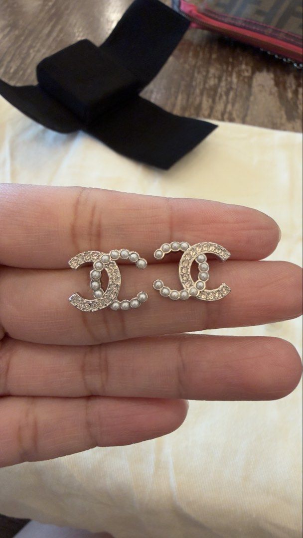 Authentic Chanel CC Earrings (Category: Earrings) located in Angat. Submitted by shopmyclosetbykris (Listing ID 1464848922, Image 2). Description: Purchased from Komehyo Japan (2022) Condition: Like new, no any flaw to mention With box Will send more actual photos upon request Guranteed Auth, has chanel serial markings at the back 15,500! LP posted! Location: Baliwag Bulacan Meet ups within Bulacan .