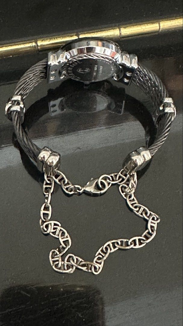 Authentic Charriol St Tropez Black Quartz (Category: Luxury Watches) located in Las Pinas. Submitted by marshmallowmax (Listing ID 1464869655, Image 3). Description: Guaranteed Authentic! Like new or looks new condition.. no flaws Best fit small size wrist With box, booklets and paperbag .