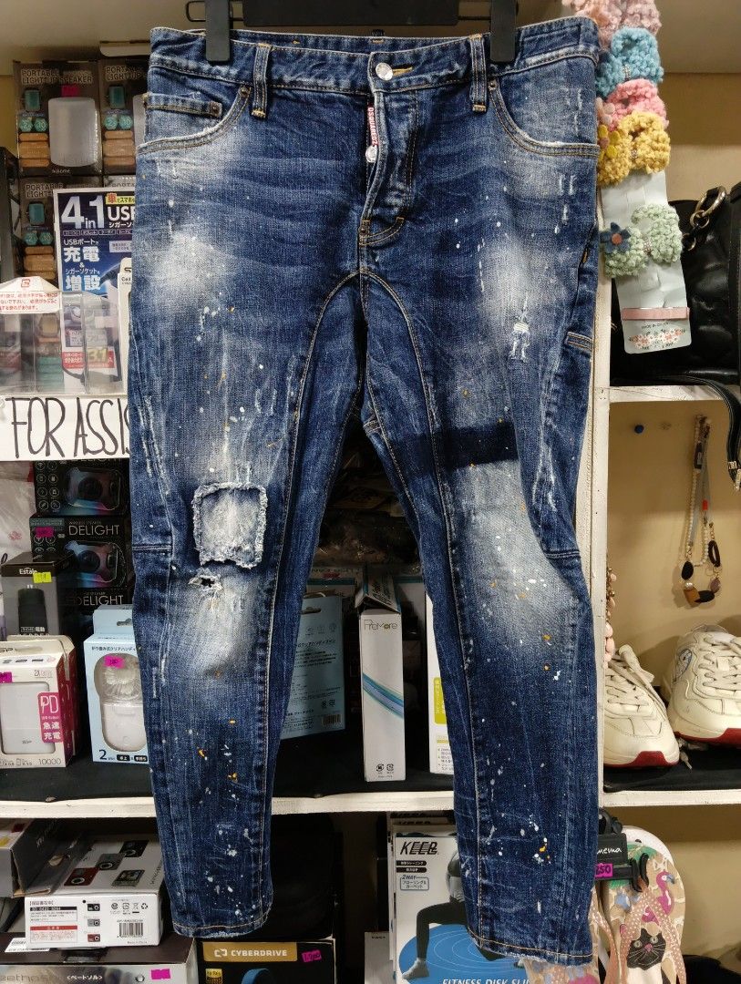AUTHENTIC DSQUARED2 Dsquared2 Slim Jeans (Category: Luxury Apparel) located in Cagayan de Oro. Submitted by warmbird-f84aab (Listing ID 1464821326, Image 1). Description: 🔥 Premium Italian-made luxury denim – S74LB0233 style 🎨 Paint splatter / distressed biker wash – iconic Dsquared2 design 📋 Details: - Tagged EU 50 (fits ~34–36 waist) - Slim fit, cropped/tapered cut - All tags, leather patch, red D2 tab, branded hardware intact - Born in Cana