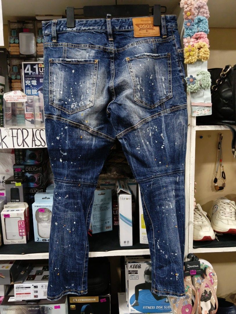 AUTHENTIC DSQUARED2 Dsquared2 Slim Jeans (Category: Luxury Apparel) located in Cagayan de Oro. Submitted by warmbird-f84aab (Listing ID 1464821326, Image 3). Description: 🔥 Premium Italian-made luxury denim – S74LB0233 style 🎨 Paint splatter / distressed biker wash – iconic Dsquared2 design 📋 Details: - Tagged EU 50 (fits ~34–36 waist) - Slim fit, cropped/tapered cut - All tags, leather patch, red D2 tab, branded hardware intact - Born in Cana