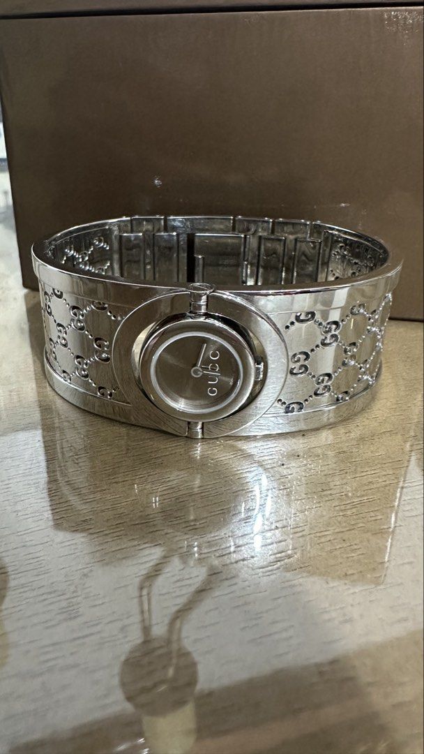 Authentic Gucci Twirl Bangle Quartz (Category: Luxury Watches) located in Las Pinas. Submitted by marshmallowmax (Listing ID 1464870087, Image 2). Description: Guaranteed Authentic! Slightly used no flaws.. fits up to 7” med size wrist Comes with original box.