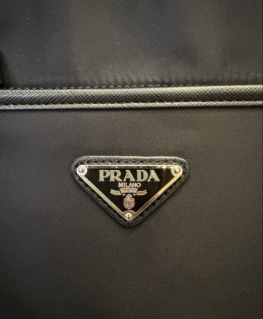 Authentic Prada Tessuto Canvas Slim Messenger Bag (Category: Sling Bags) located in Manila. Submitted by mrsmdxbseller (Listing ID 1464911496, Image 3). Description: .