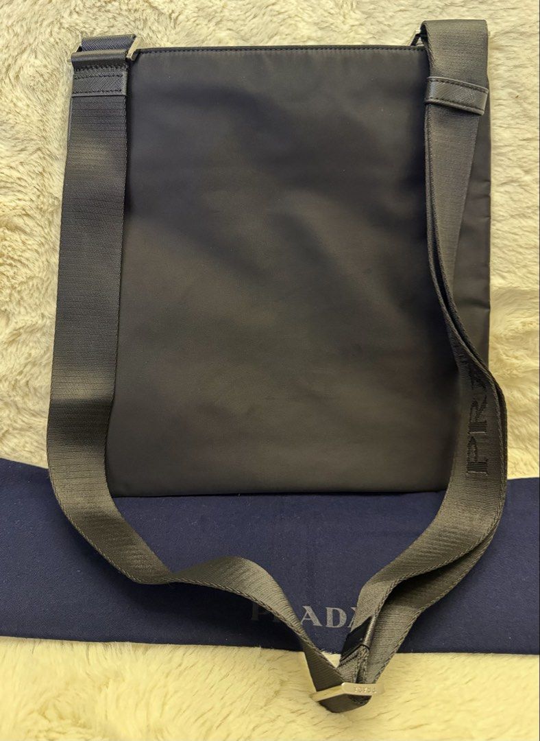 Authentic Prada Tessuto Canvas Slim Messenger Bag (Category: Sling Bags) located in Manila. Submitted by mrsmdxbseller (Listing ID 1464911496, Image 2). Description: .