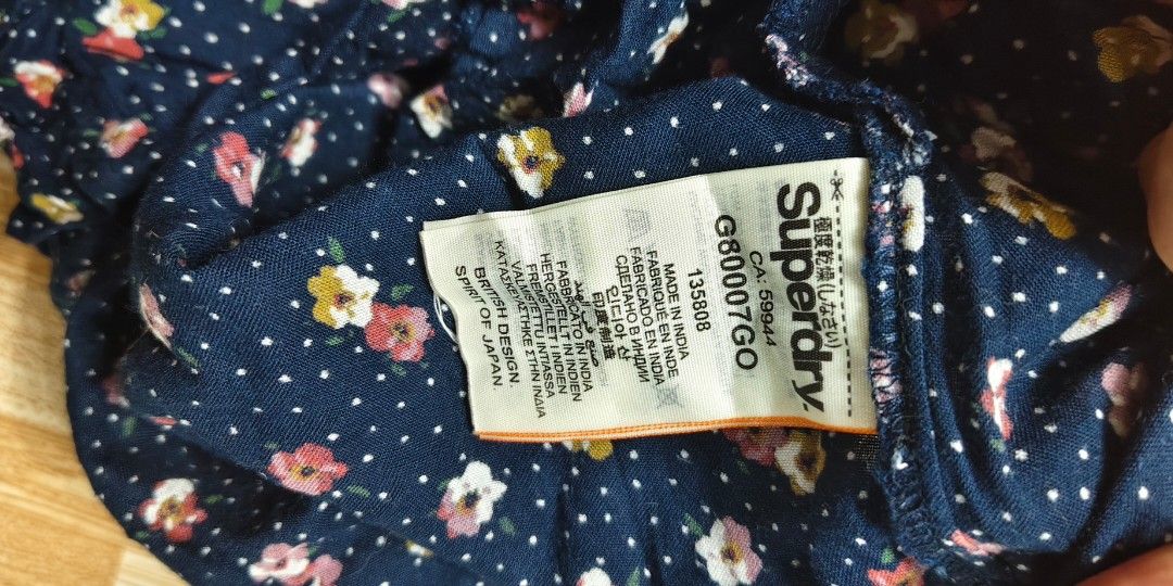 Authentic Superdry Romper — Size Small — Floral Navy (Category: Rompers) located in Manila. Submitted by mrscanoy (Listing ID 1464807541, Image 3). Description: ✅ Authentic Superdry Romper ✅ Size Small — fits Small to Medium ✅ Navy blue with floral & polka dot print ✅ Adjustable spaghetti straps ✅ Button-down front ✅ Excellent condition — walang butas, walang mantsa, walang sira ✅ Maganda ang tela, malambot at presko ✅ Galing ukay — orihinal, hin