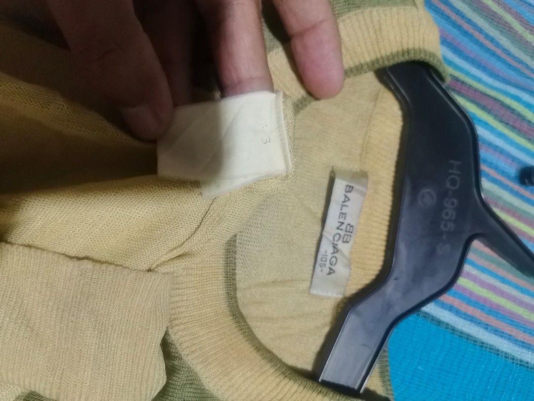 Balenciaga knitted shirt (Category: Blouses) located in Vinzons. Submitted by khasanche43622 (Listing ID 1464913661, Image 3). Description: Excellent condition L-27.5 W-22 Need wash fresh from bale Medyo faded n Un washtag.
