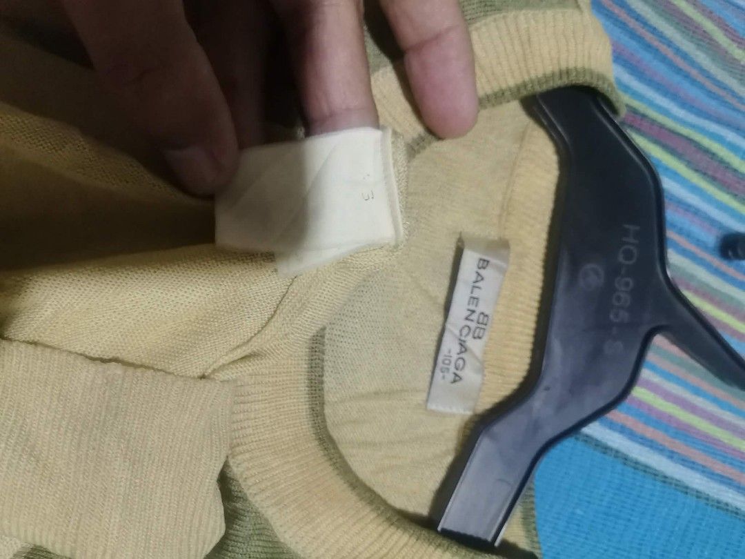 Balenciaga knitted shirt (Category: Blouses) located in Daet. Submitted by thriftnidiegz (Listing ID 1464913884, Image 3). Description: excellent condition L-27.5 W-22 need wash fresh from bale medyo faded n un wash tag.
