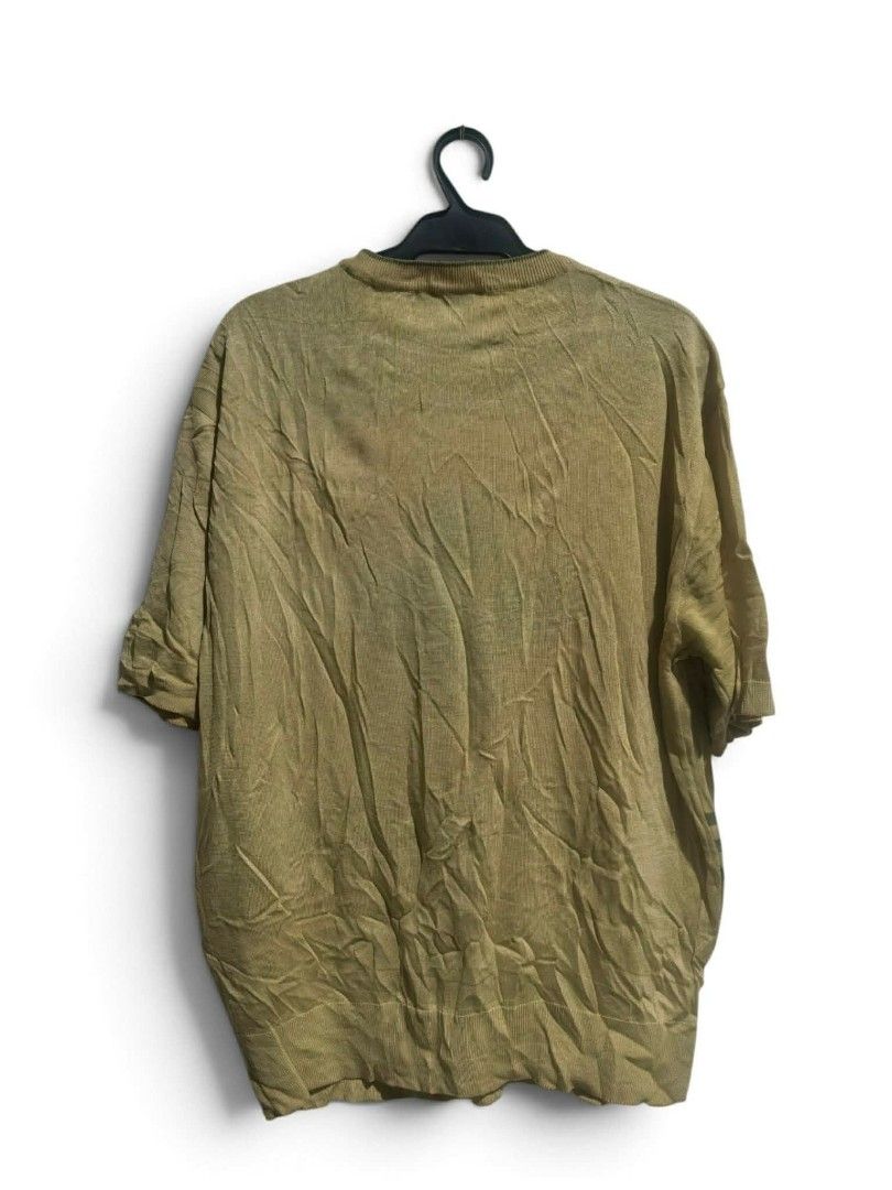 Balenciaga knitted shirt (Category: Blouses) located in Vinzons. Submitted by kspabico07187 (Listing ID 1464922191, Image 2). Description: Excellent condition L-27.5 W-22 Need wash fresh from bale Medyo faded n un washtag.