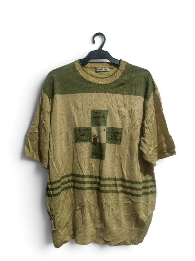 Balenciaga knitted shirt (Category: Blouses) located in Vinzons. Submitted by kspabico07187 (Listing ID 1464922191, Image 1). Description: Excellent condition L-27.5 W-22 Need wash fresh from bale Medyo faded n un washtag.