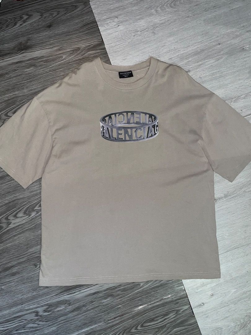 BALENCIAGA RING LOGO aka ''Trompe L'oeil Ring'' (Category: Tshirts & Polo Shirts ) located in Talisay. Submitted by steve_owa (Listing ID 1464889410, Image 1). Description: Dimension 23x28 Fit:Oversized Boxy No issue •HARD TO FIND .