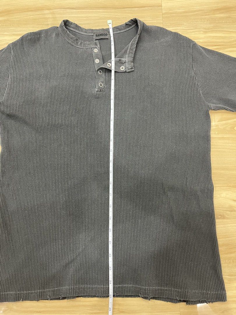Ribbed Henley (Category: Tshirts & Polo Shirts ) located in Angeles City. Submitted by thriftsij (Listing ID 1464943122, Image 3). Description: - Brand: Bamboo - 20/25 - Distressed Dark grey vintage wash - Ribbed knit - Short sleeves, metal snap button front placket, distressed raw edges on collar and hem .