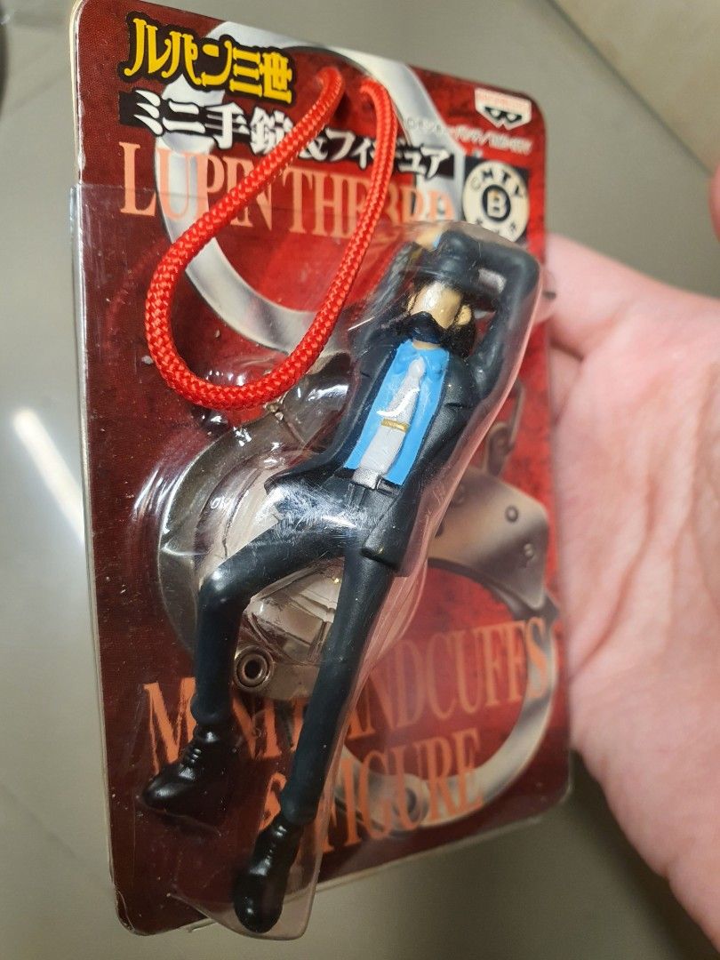 Banpresto Lupin the Third Mini Handcuffs Figure Strap (Category: Figurines & Statues) located in Caloocan City. Submitted by letgosurplus (Listing ID 1464900113, Image 2). Description: - Authentic Banpresto Lupin the Third mini figure keychain - Released in 2004, featuring Lupin in a blue jacket with miniature handcuffs 🛵 Lalamove / Grab / J&T Express Loc: Caloocan City, Metro Manila.