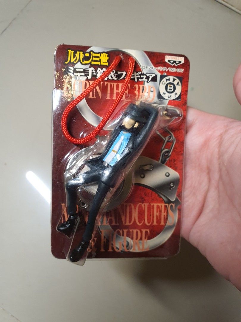 Banpresto Lupin the Third Mini Handcuffs Figure Strap (Category: Figurines & Statues) located in Caloocan City. Submitted by letgosurplus (Listing ID 1464900113, Image 1). Description: - Authentic Banpresto Lupin the Third mini figure keychain - Released in 2004, featuring Lupin in a blue jacket with miniature handcuffs 🛵 Lalamove / Grab / J&T Express Loc: Caloocan City, Metro Manila.