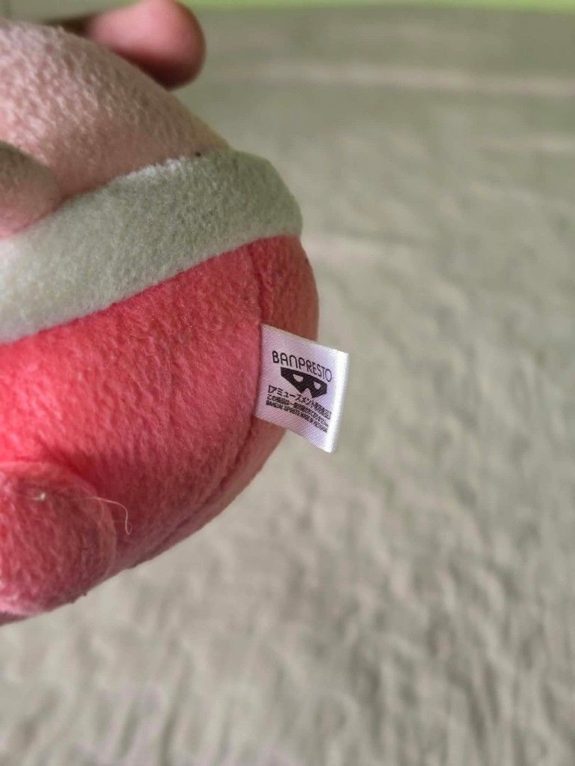 Banpresto Pokémon Cherubi Plush Toy (Category: Plushies & Soft Toys) located in Baguio. Submitted by je_ver_lyn16 (Listing ID 1464845492, Image 3). Description: - Authentic Banpresto Cherubi Pokémon plush - Features pink body, curly stem, white belly, and stitched face - Includes original side tag and top hanging loop - Perfect addition to any Pokémon plush collection.