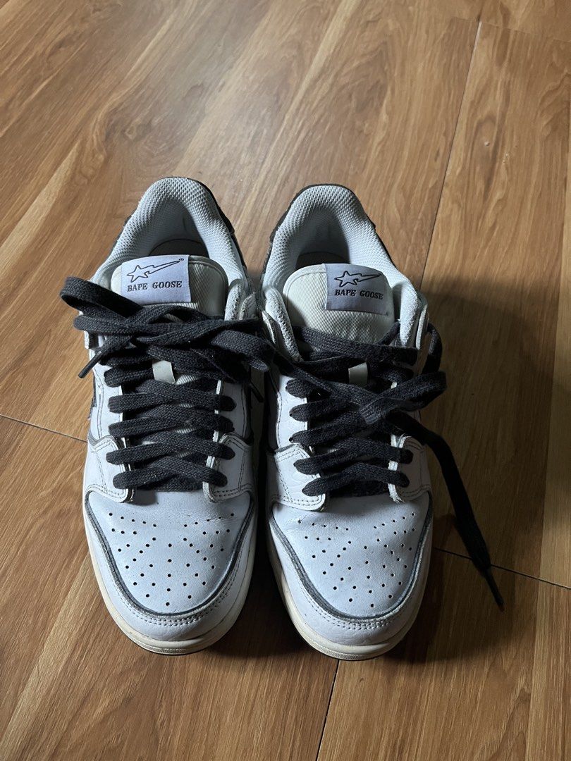Bape Goose Bapesta Shoes (Category: Sneakers) located in Manila. Submitted by shanaaa.collects (Listing ID 1464838580, Image 1). Description: - Model: Bape Goose sneakers - Colorway: Grey and white with black laces - Design: Star logo on side panel and tongue tag, textured heel overlay with embroidered text - Comfort: Thick padded collar - Sole: Rubber outsole with tread pattern - Condition: Clean uppers, minor wear on soles.