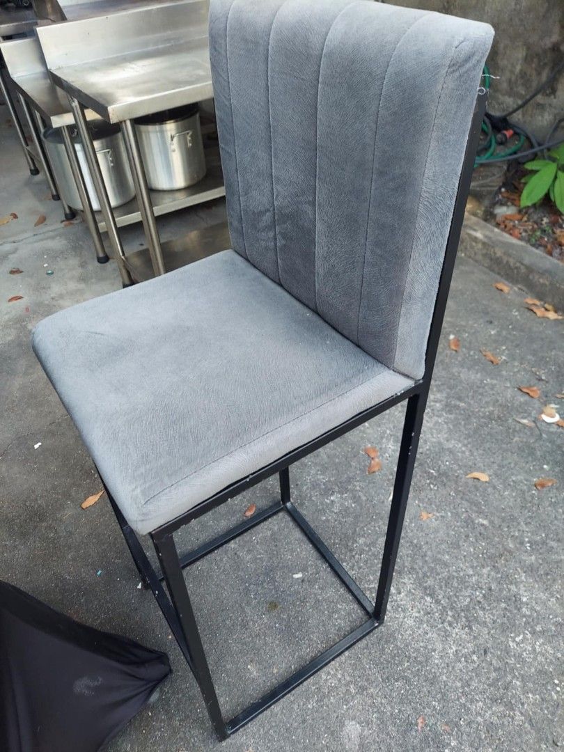 Bar Table with Two Upholstered Chairs Set (Category: Tables & Sets) located in Angeles City. Submitted by pamdiel003 (Listing ID 1464803006, Image 2). Description: - Complete bar set: 1 tall round table with black stretch fabric cover and 2 matching high bar stools - Stylish grey tufted velvet upholstery on the stools with sleek black metal frames - Sturdy and durable construction designed for daily use - Clean, modern aesthetic ideal for home ba