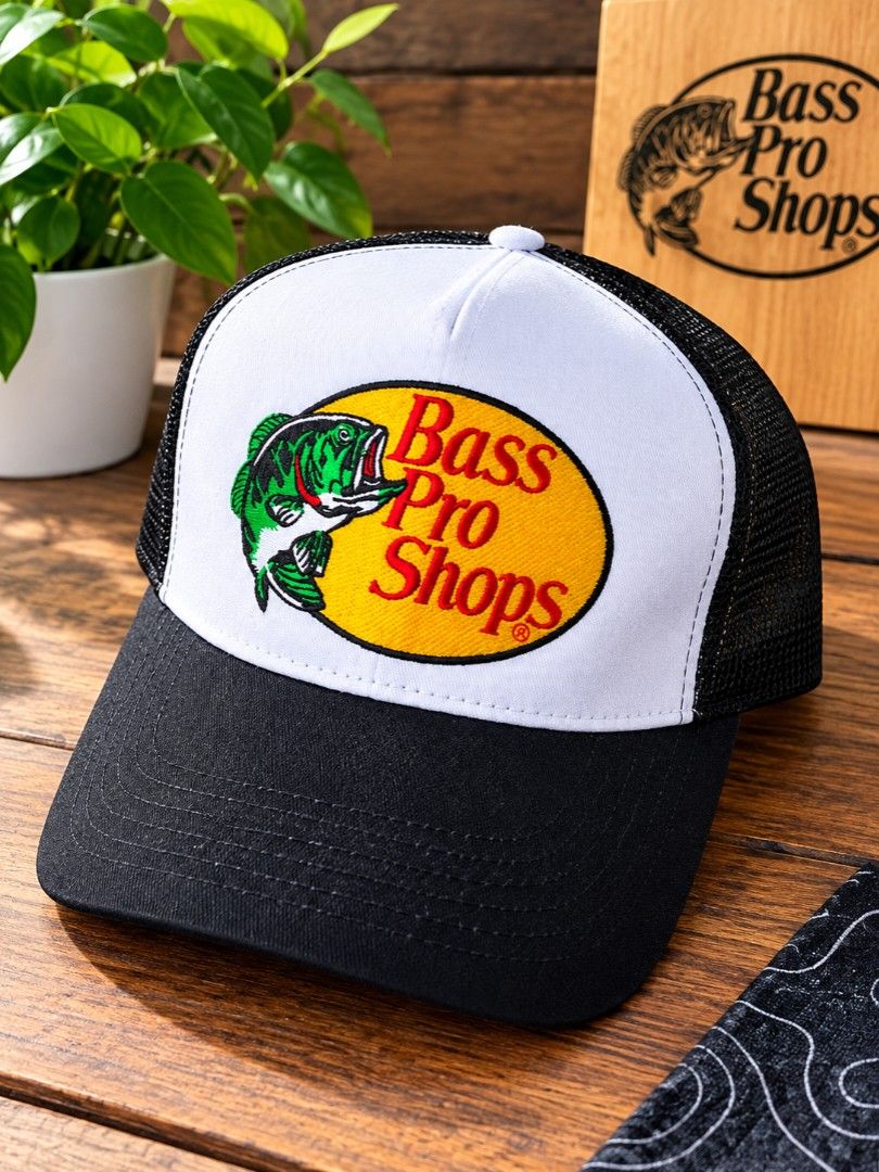Bass Pro Shops Trucker Hat - Black (Category: Caps & Hats) located in Caloocan City. Submitted by memelpogi21 (Listing ID 1464529887, Image 1). Description: - Two Bass Pro Shops trucker hats included: one red/white, one black/white. - Features the iconic Bass Pro Shops logo with a fish design. - Breathable mesh back for comfort. - One size fits most design. - Ideal for fishing adventures or casual, stylish wear..