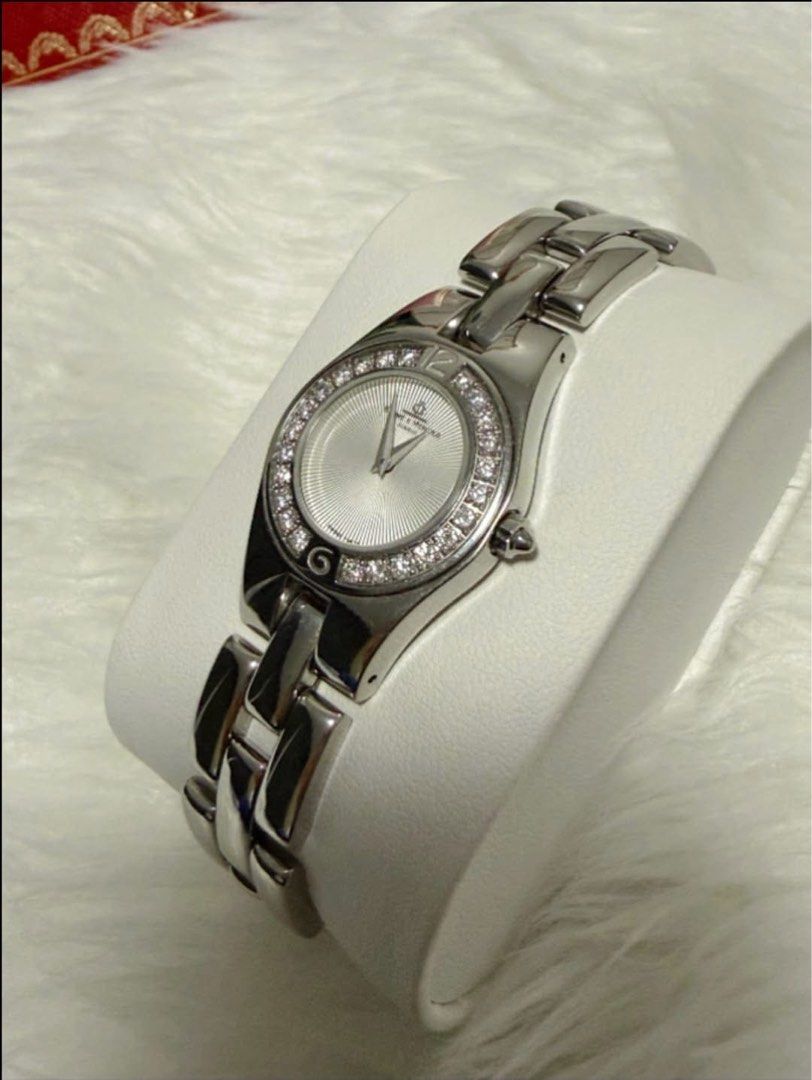 Baum€ & Merci€r (Category: Women's Watches) located in Manila. Submitted by annafinds (Listing ID 1464858978, Image 2). Description: Baum€ & Merci€r luxury ladies’ wristwatch, a stainless steel case and a dazzling diamond-set bezel. - Size 7 or smaller With provided box ₱37,500 Open for layaway..